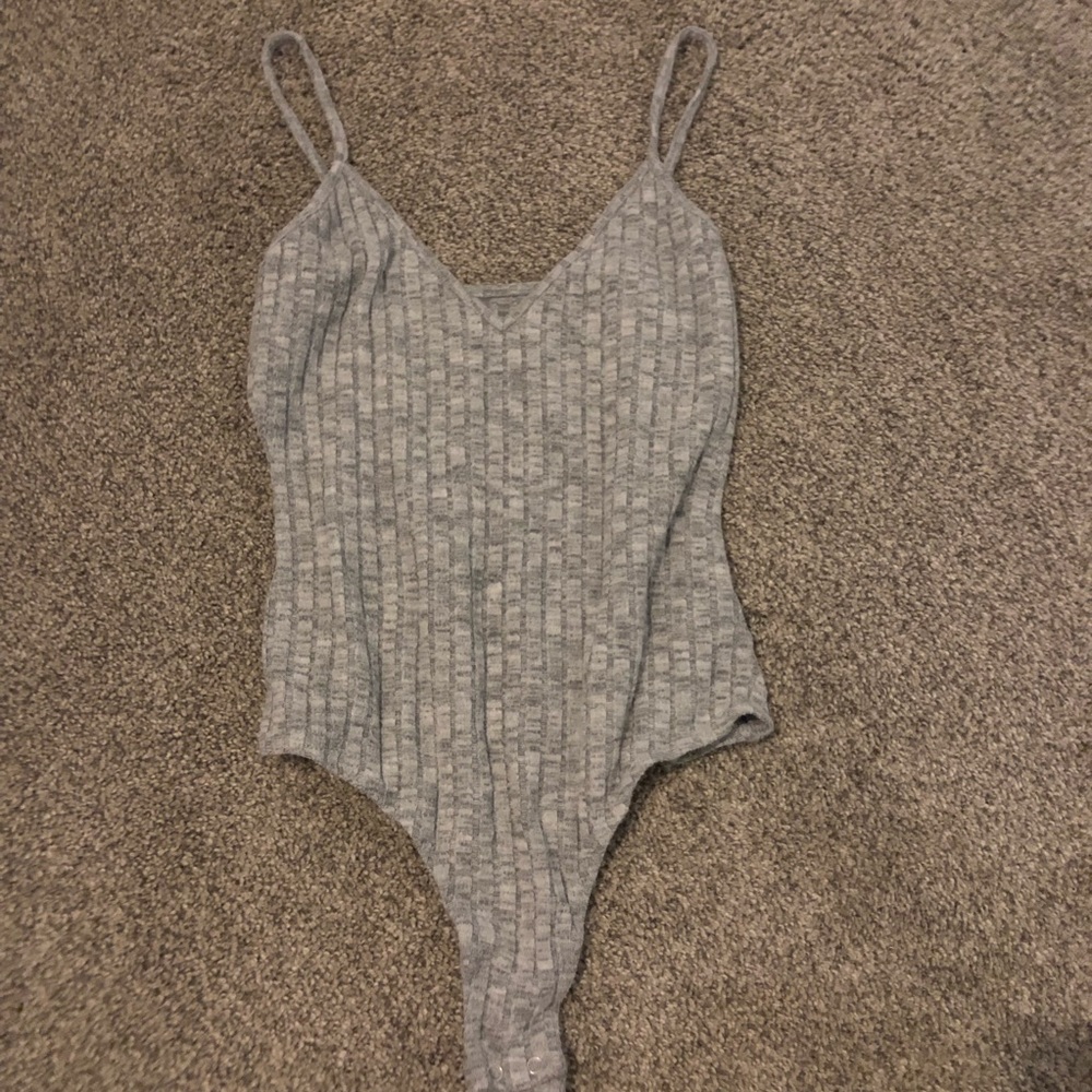 Me to We bodysuit